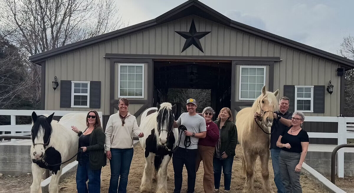 Participants with horses during an HHH immersion retreat